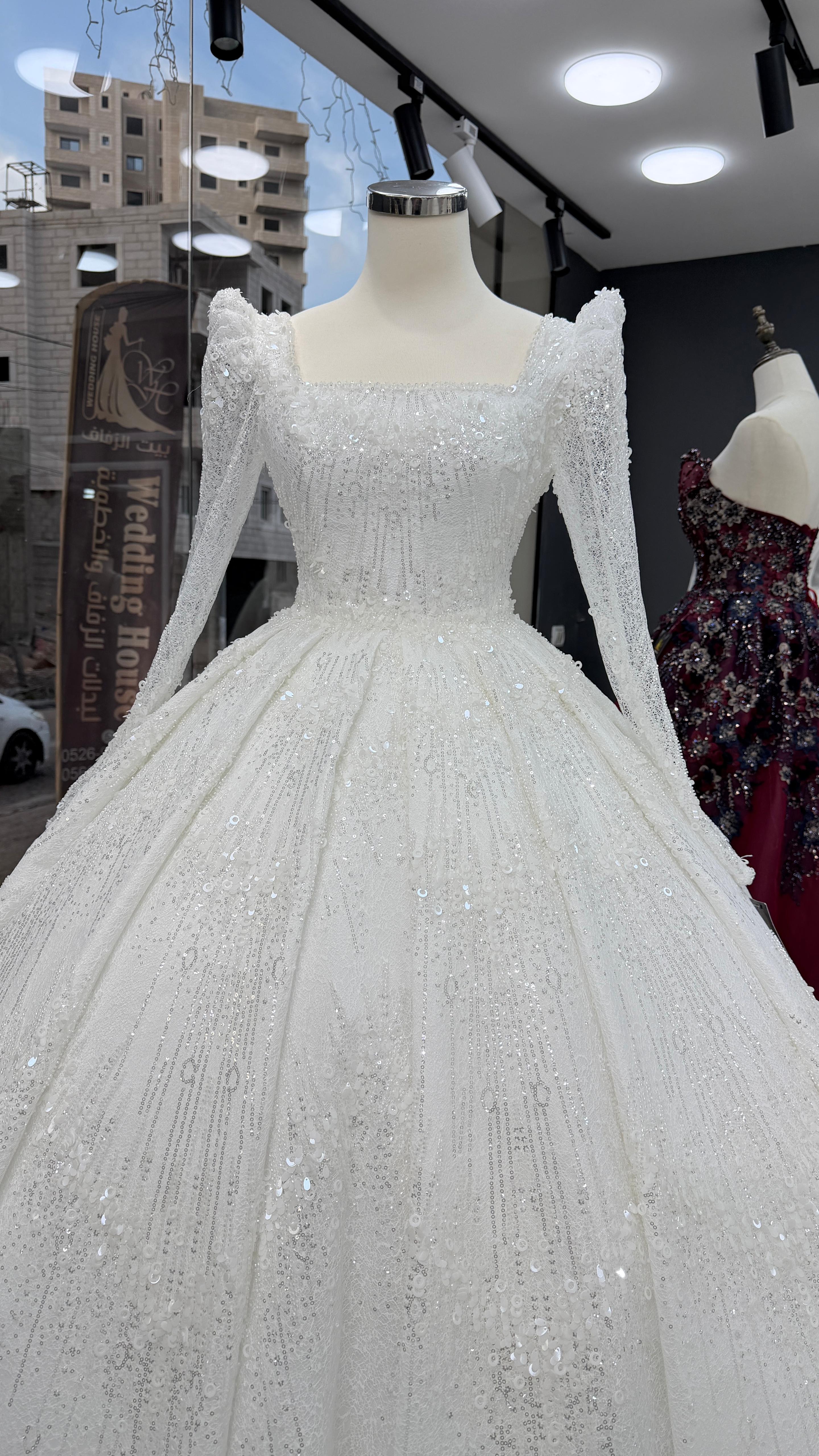 بدلات ابيض امين