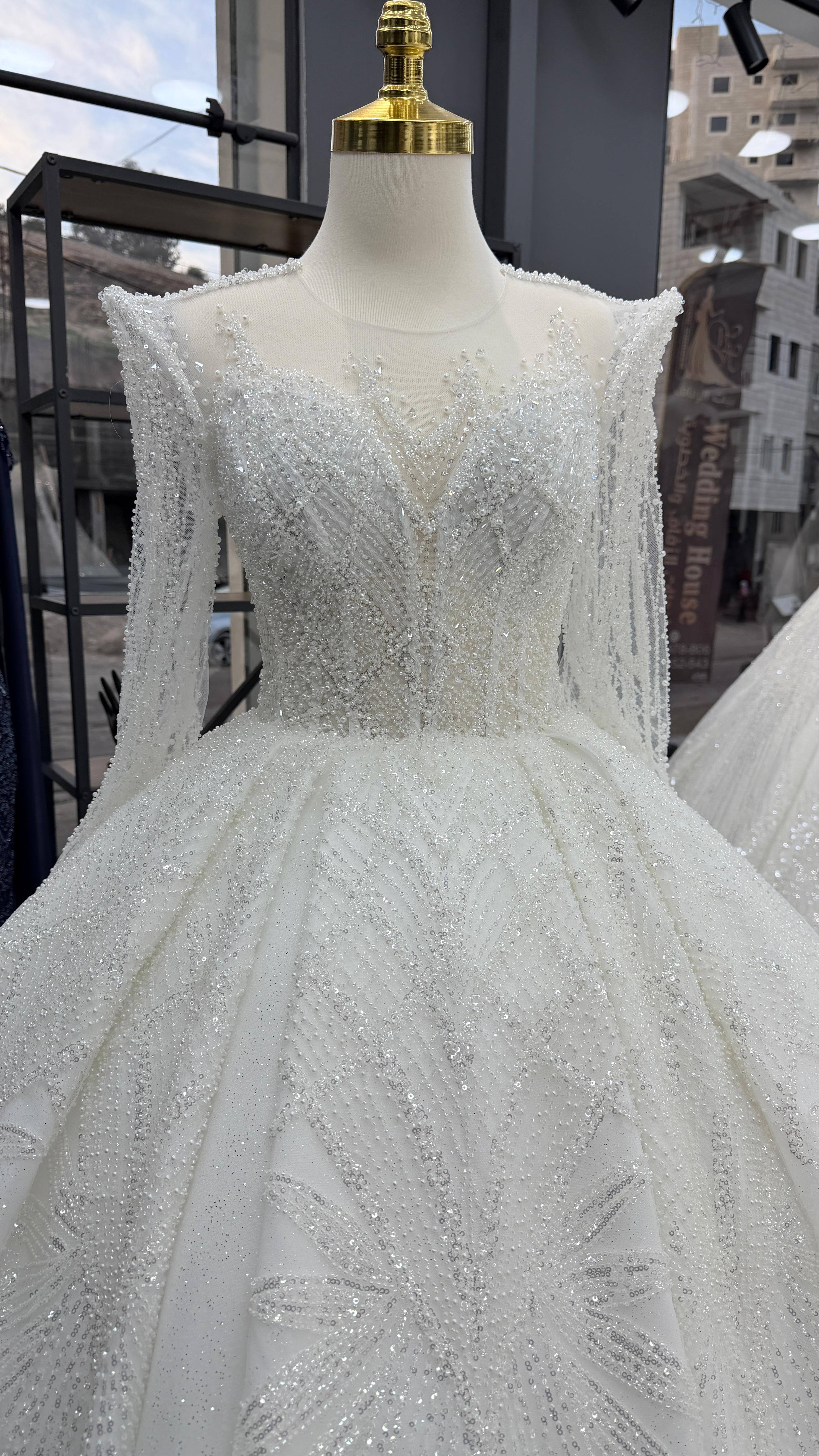 بدلات ابيض امين